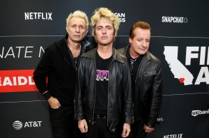 Mike Dirnt, Billie Joe Armstrong, and Tr√© Cool of Green Day attend the FIREAID Benefit Concert for California Fire Relief at Intuit Dome on January 30, 2025 in Inglewood, California. (Photo by Kevin Mazur/Getty Images for FIREAID)
