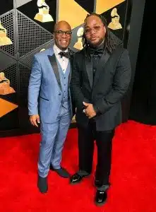 Jonathan Azu, left, and Leon Thomas at the 2024 Grammy Awards.