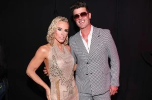 Jenny McCarthy, Robin Thicke at the 2025 iHeartRadio Music Awards held at the Dolby Theatre on March 17, 2025 in Los Angeles, California.