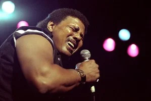 Aaron Neville performing with the Neville Brothers at the Warfield Theater in San Francisco on December 31, 1991.