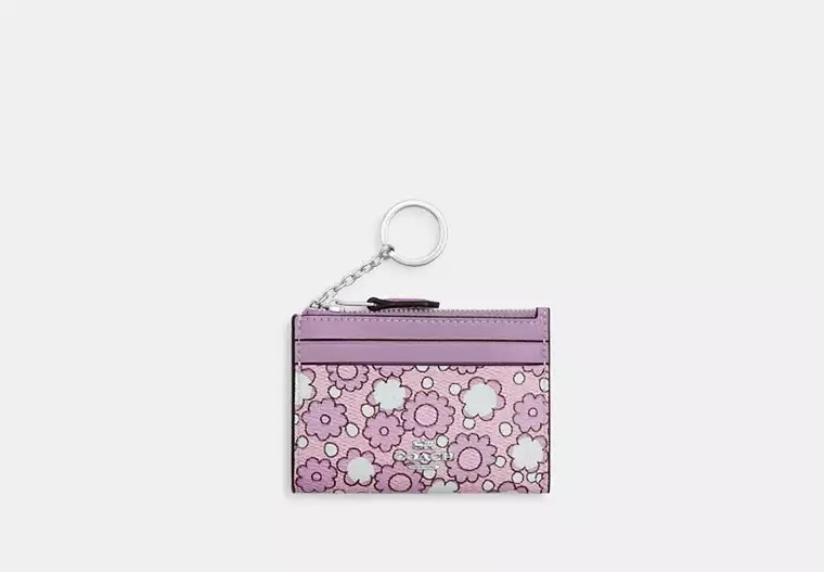 Coach Outlet's Latest 60s Floral Drop Will Upgrade Your Accessories