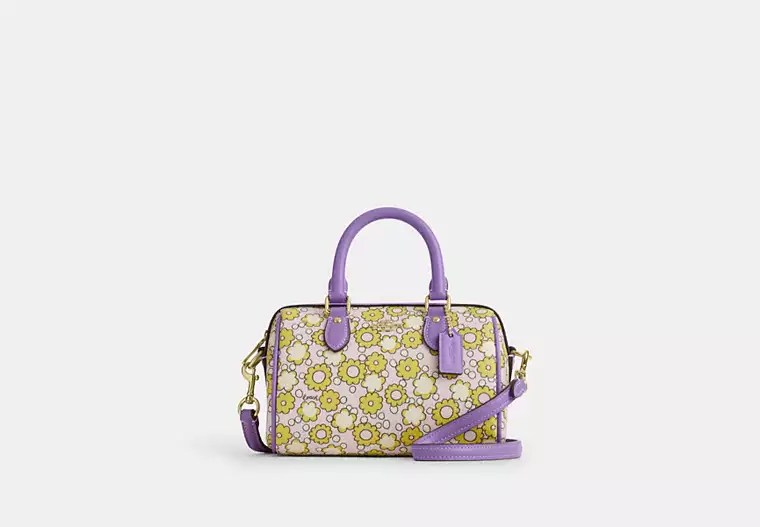 Coach Outlet's Latest 60s Floral Drop Will Upgrade Your Accessories