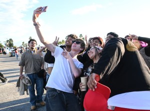 Malcolm Todd takes a selfie with fans at Tyler The Creator’s Camp Flog Gnaw Carnival held at Dodger Stadium on Nov. 22, 2025 in Los Angeles, California.