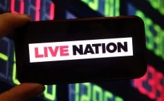 In this photo illustration, the Live Nation company logo is seen displayed on a smartphone screen.
